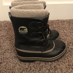 Kids size one sorel snow boots